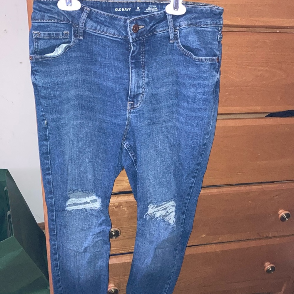 Blue jeans ripped knees